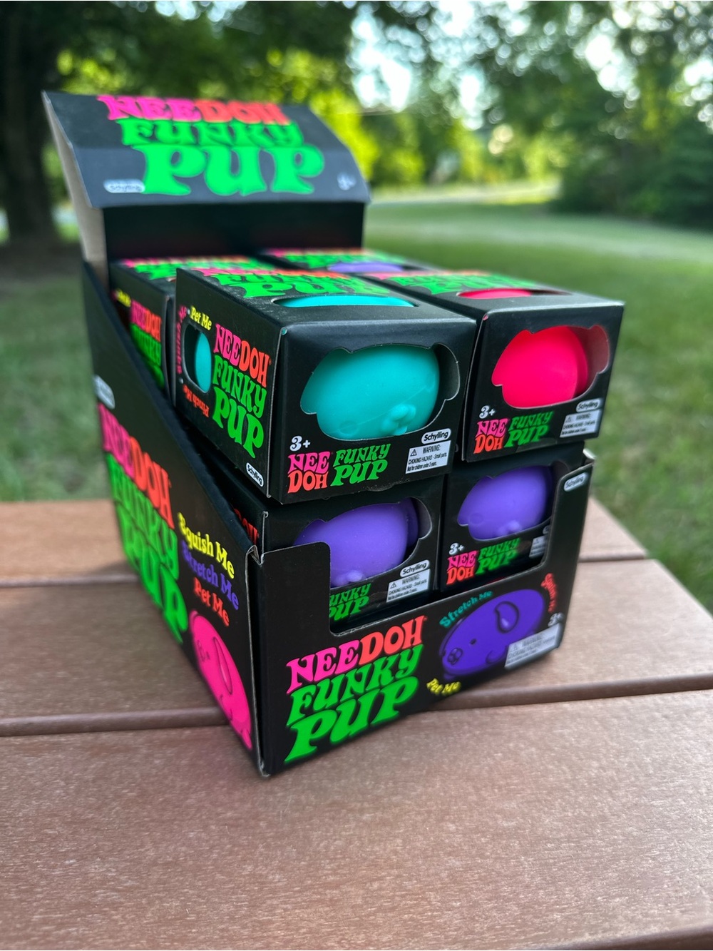 (12) Needoh Funky Pup Squish Toys